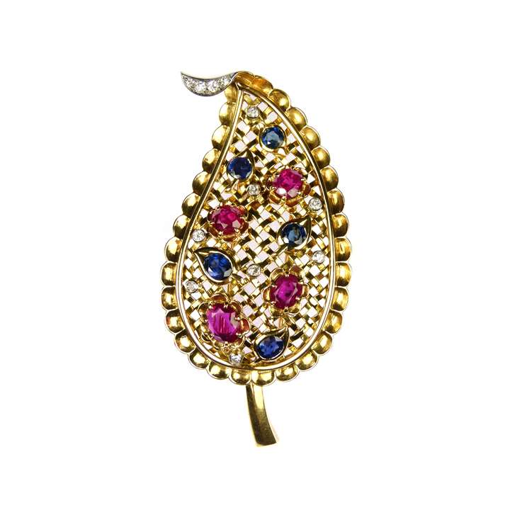 Gold, ruby, sapphire and diamond Indianesque leaf brooch made in France probably for retail in America